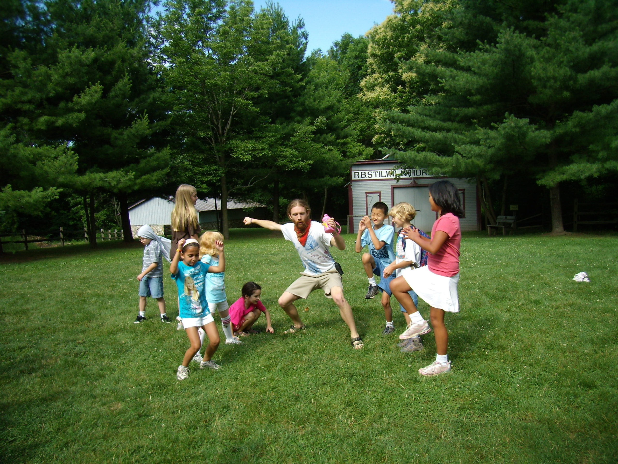 kids playing with nature guide camp